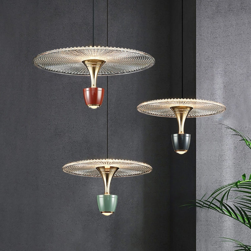 Elegant Glissara pendant light, a modern ceiling fixture for inviting dining room or living room ambiance.