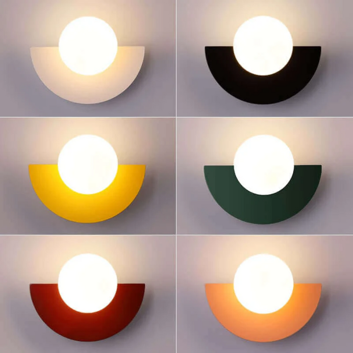 Sleek metal Half Moon LED Wall Lamp. Modern decorative fixture providing soft, energy-efficient ambient light.