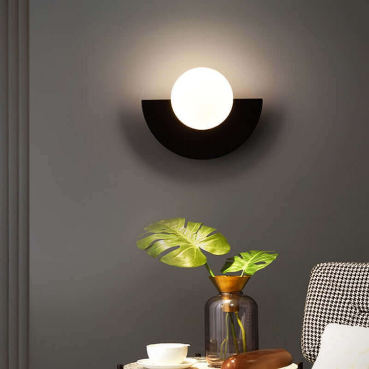 Stylish Half Moon LED Wall Sconce. Modern design perfect for bedroom or living room ambient lighting.