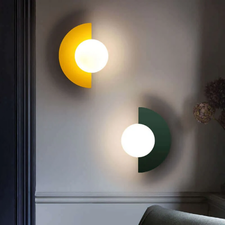 Elegant Half Moon LED Wall Light. Modern metal fixture for stylish home lighting in bedrooms or halls.