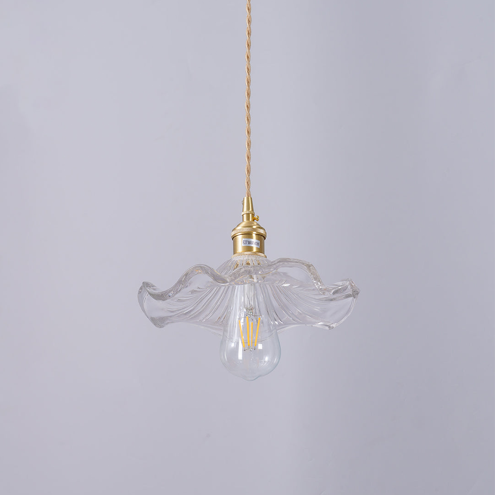 Elegant brass hibiscus pendant lamp, a stunning flower light fixture for modern home decor.