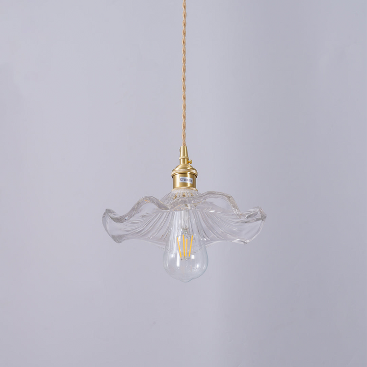 Elegant brass hibiscus pendant lamp, a stunning flower light fixture for modern home decor.
