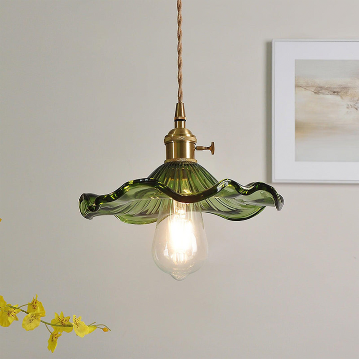 Unisex hibiscus glass pendant light fixture, a stylish flower lamp for modern home interiors.
