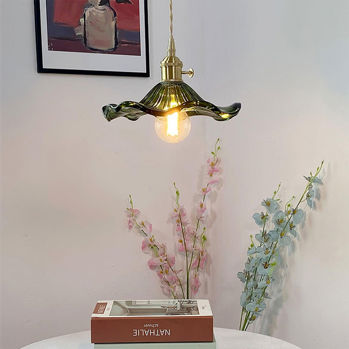 Decorative hibiscus pendant lamp, featuring a modern flower design in glass and brass.