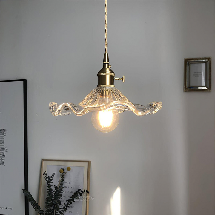 Modern flower light, a hibiscus pendant lamp crafted from glass and brass for home decor.