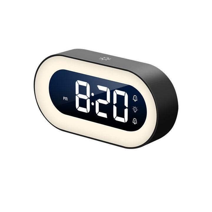 Modern home digital alarm clock with dimmable night light. Clear display, ideal for bedside.