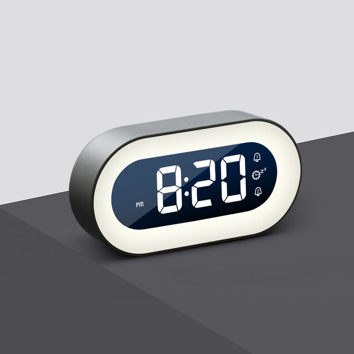 Digital alarm clock with dimmable night light, providing a gentle light and reliable alarm.
