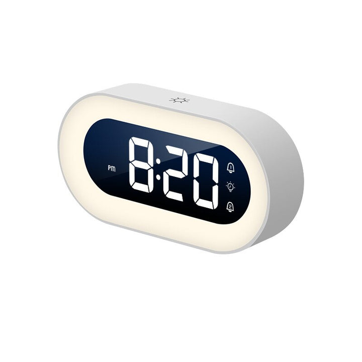Portable USB-C digital alarm clock with dimmable LED night light for home or travel.