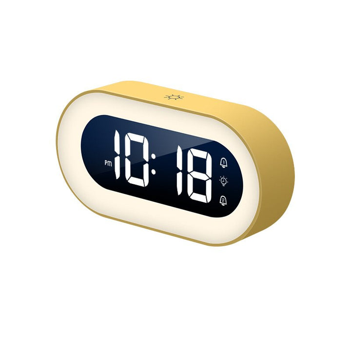 Home digital alarm clock with dimmable night light. Offers a gentle glow and alarm function.
