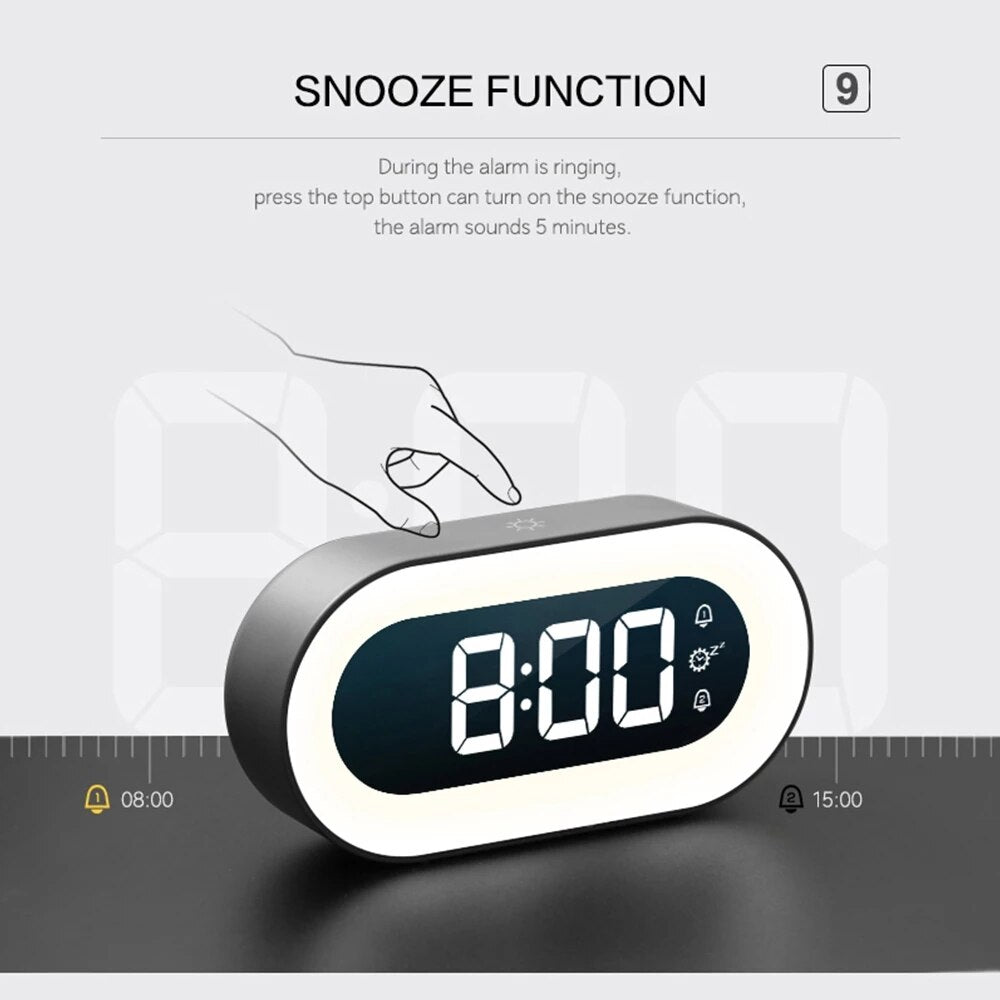 Sleek digital alarm clock featuring a dimmable night light and easy-to-read display.