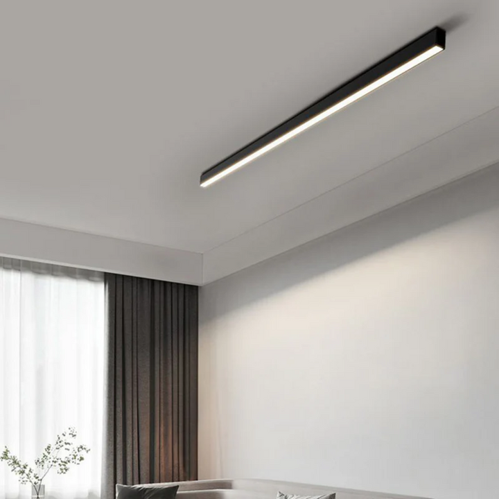 Stylish Stratum industrial linear LED ceiling light, perfect modern lighting for living rooms.
