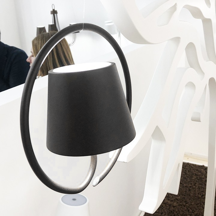 Dimmable AuraGlow modern LED pendant light, creating the perfect ambiance for any indoor or outdoor area.