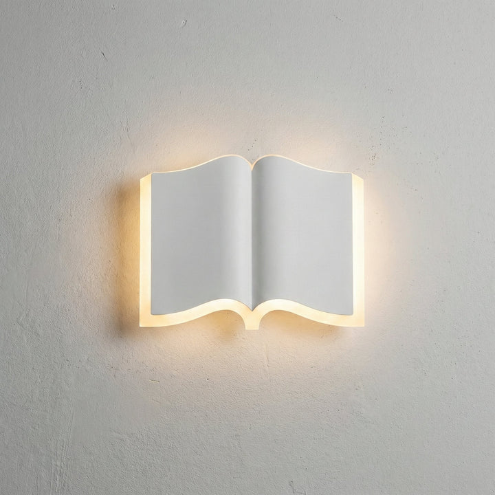 Stylish BookLume wall sconce, a unique book lamp adding decorative touch to walls
