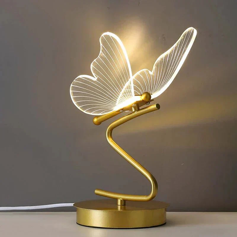 Contemporary LED table lamp with a unique butterfly design, ideal as an accent lighting piece