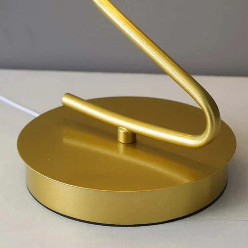 Elegant LED butterfly lamp on a wooden desk, providing task lighting and a decorative touch