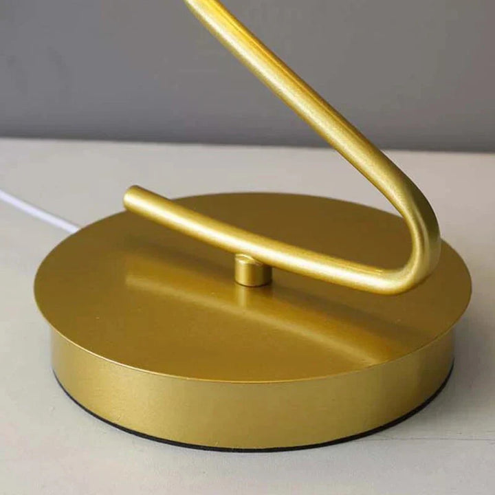 Elegant LED butterfly lamp on a wooden desk, providing task lighting and a decorative touch