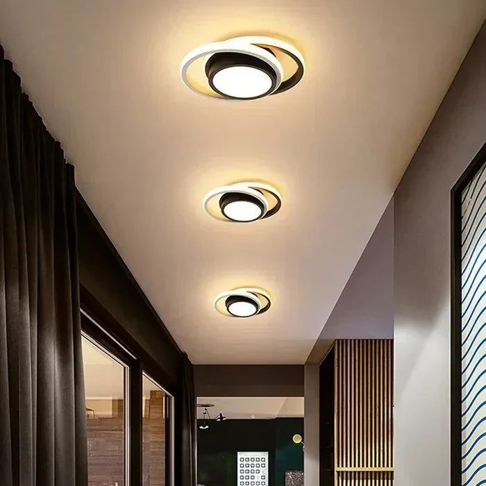 Twilight Rings modern LED ceiling lamp, a sleek light fixture for hallways & contemporary decor.