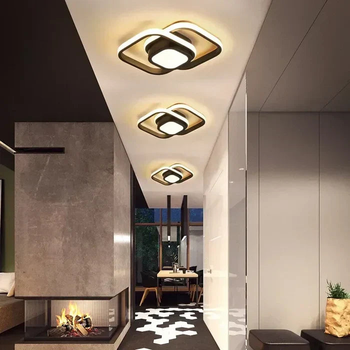 Elegant modern LED ceiling lamp with unique double ring design, ideal for energy-efficient interior lighting.