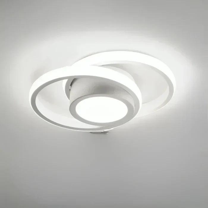 Warm white modern LED ceiling lamp, double ring design provides inviting interior lighting for home decor.