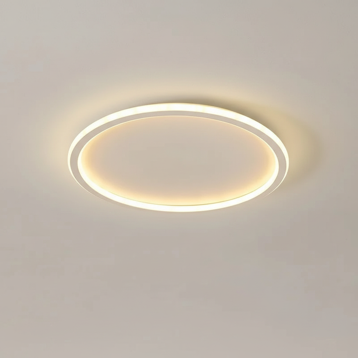Modern circular LED light, chrome accents, adds a chic touch to any room
