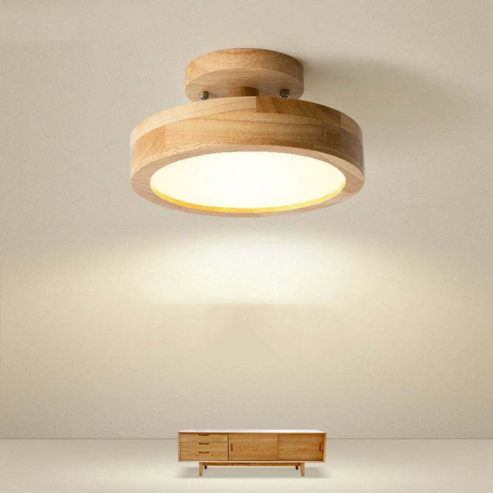 Sleek modern LED ceiling light, LunaLux, bringing ambient light to your bedroom.