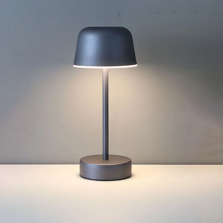 Dimmable LED cord-free table lamp, LumoPulse, offering flexible lighting and sophisticated home decor