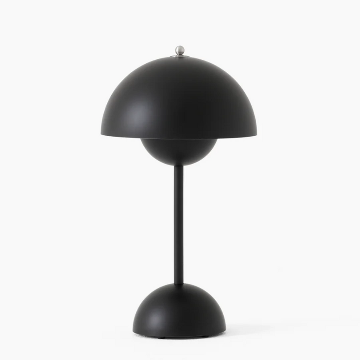 Contemporary LED desk light in black, with adjustable neck and ambient light.