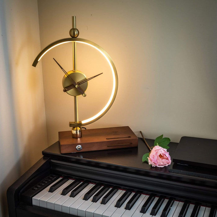 Ergonomic smart lamp for desk: LED light, wireless charger, clock, & adjustable arm.