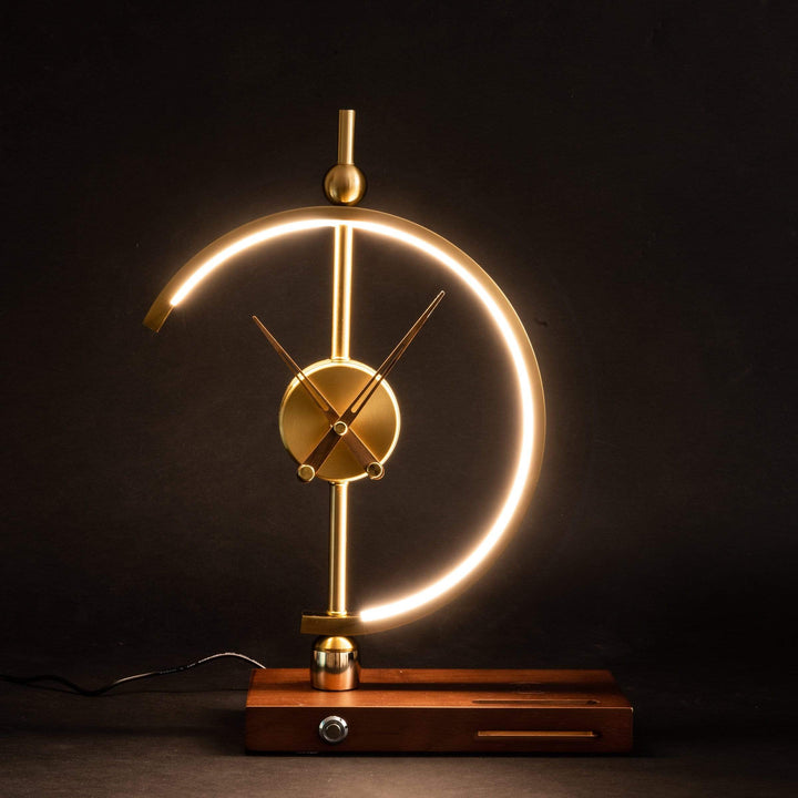 Smart LED desk lamp with adjustable light modes, rechargeable battery & integrated wireless charging pad.