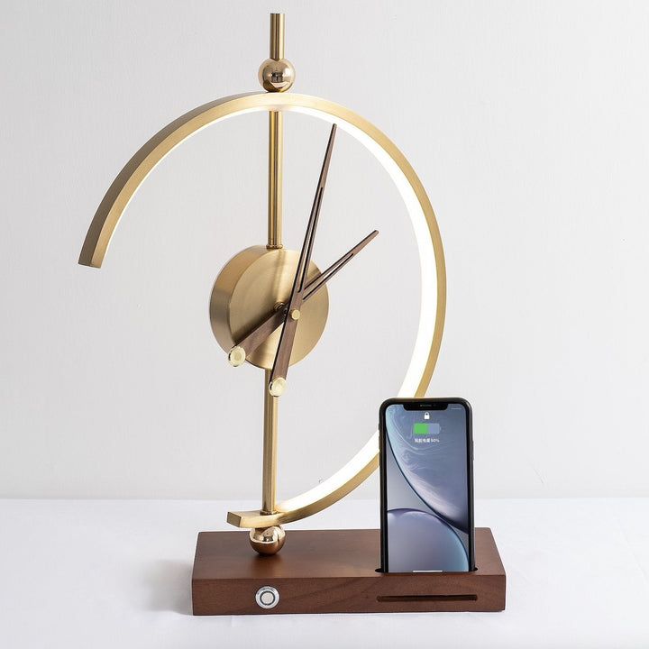 Portable rechargeable LED desk lamp with wireless charging pad & clear digital clock.
