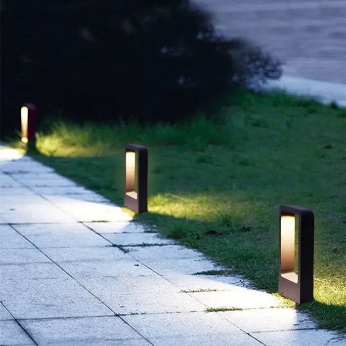 Modern LED ground spot light, waterproof, for outdoor garden & pathway illumination.