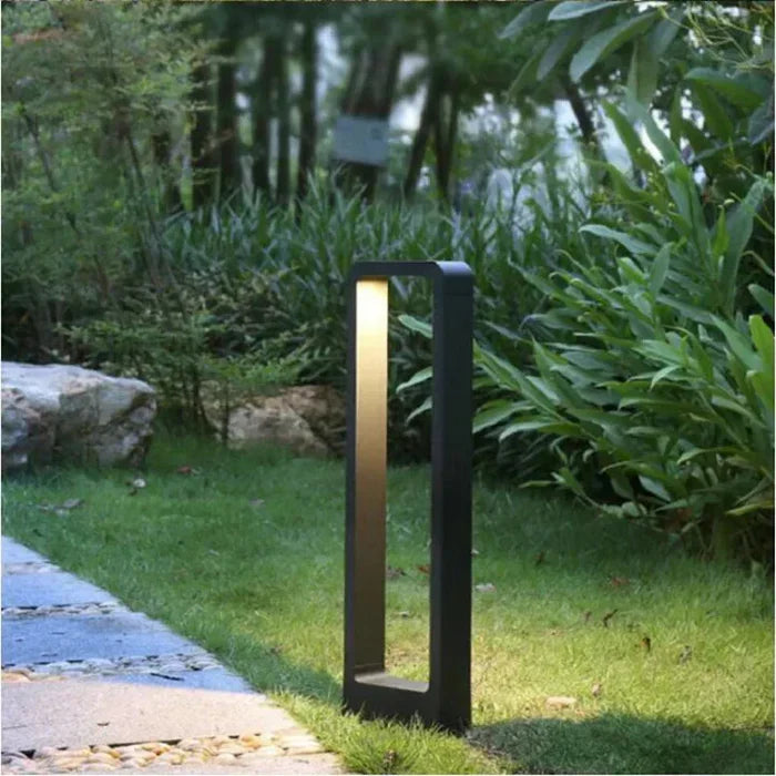 Waterproof LED ground spot, ideal for exterior garden, deck, and pathway accent lighting.