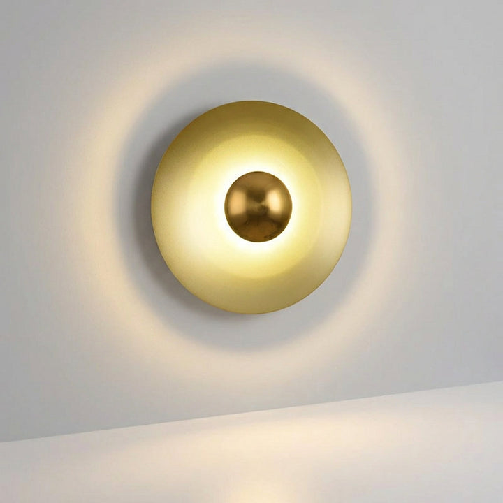 Modern LED halo wall sconce by Auroryn, creating a unique ambient lighting effect and home decor