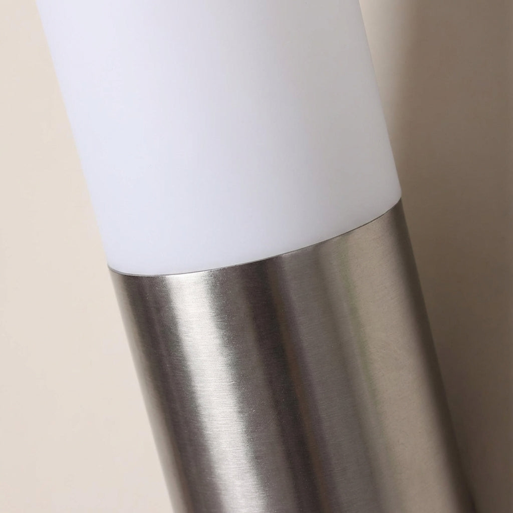 Weatherproof LED wall sconce, modern design, black, perfect for outdoor home lighting.