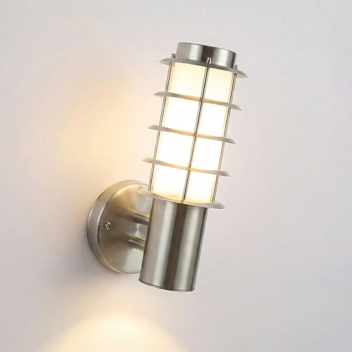 Contemporary exterior wall light, LED technology, motion activated for added security and style.