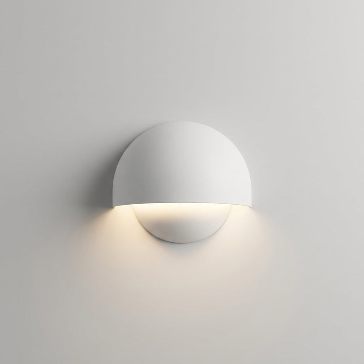 Stylish LED outdoor wall light, weather-resistant, provides ambient light for modern home exteriors
