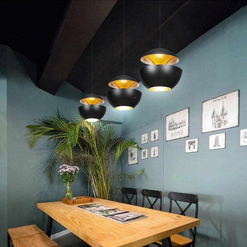 Modern LED pendant light, illuminating dining rooms with its sleek design.