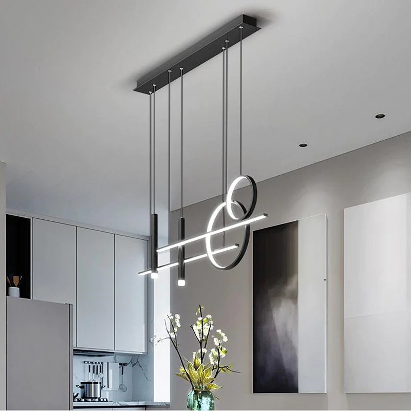 Close-up of a modern black LED pendant light, showcasing sleek contemporary design & quality finish.