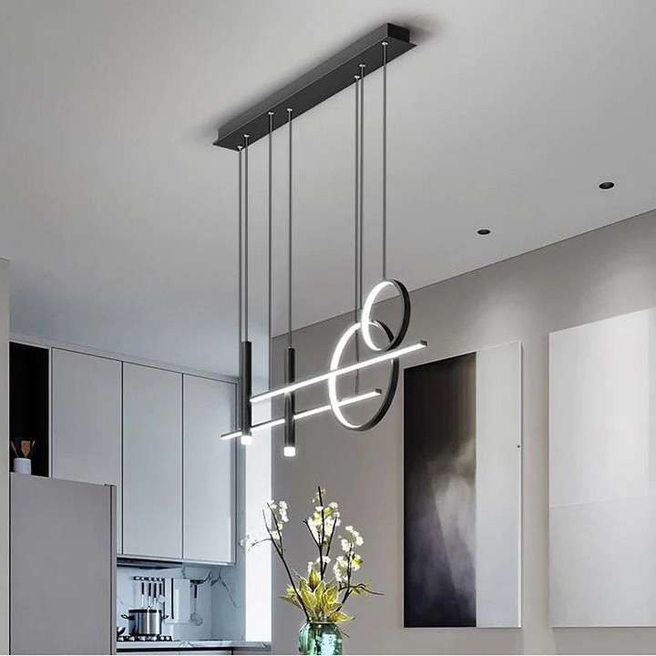 Close-up of a modern black LED pendant light, showcasing sleek contemporary design & quality finish.