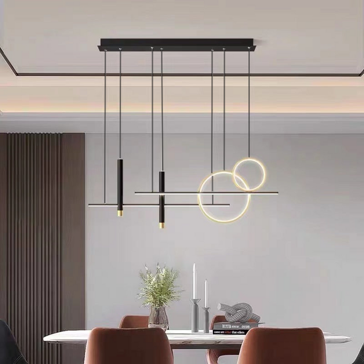 Modern LED pendant light illuminating a stylish dining room, a contemporary ceiling lamp & home decor piece.