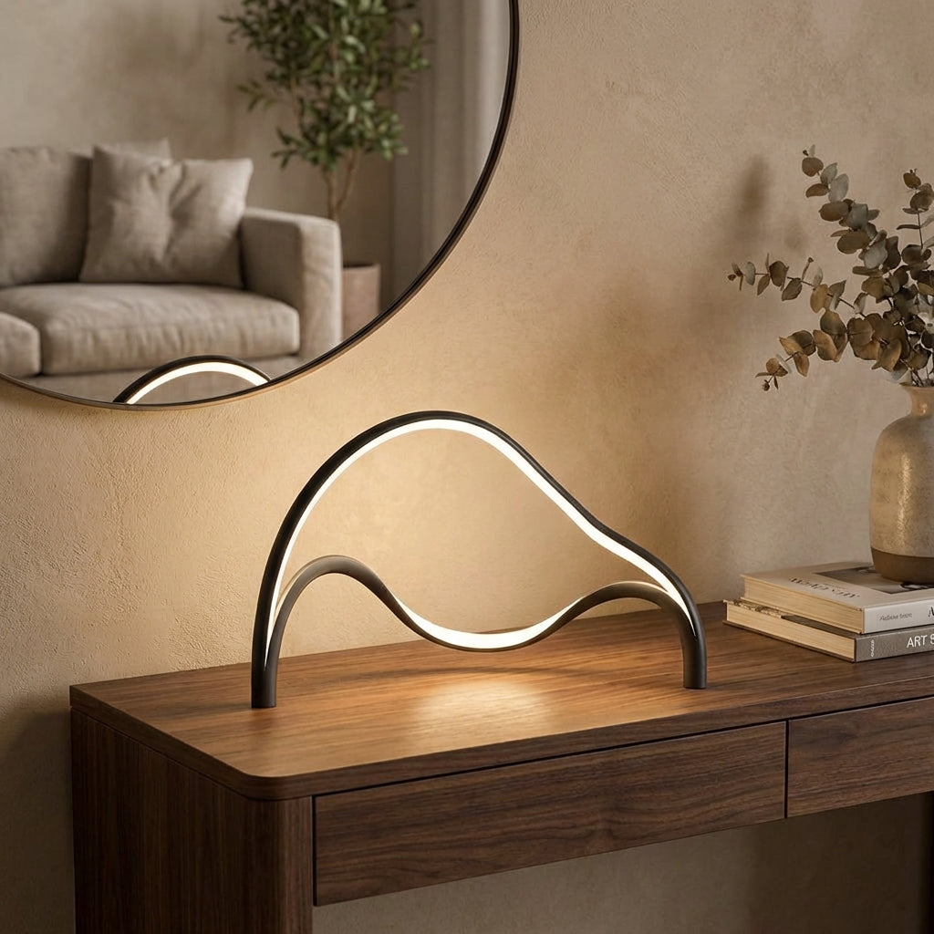 Modern LED Sculptural Table Lamp, Arcelle, with elegant curved design, perfect for desk or bedside.