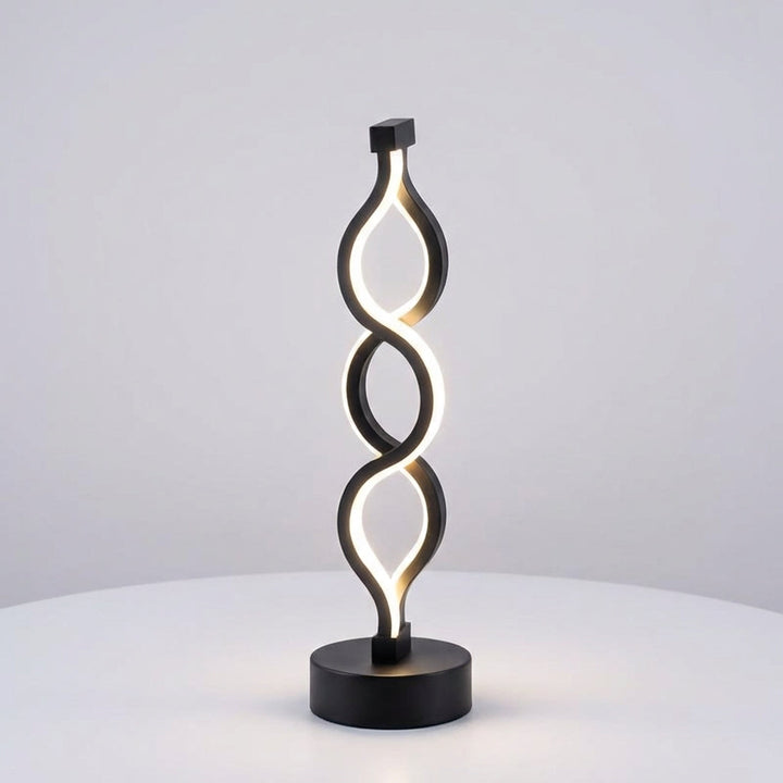 Contemporary Spirique LED table lamp with elegant spiral design, perfect for modern interiors.