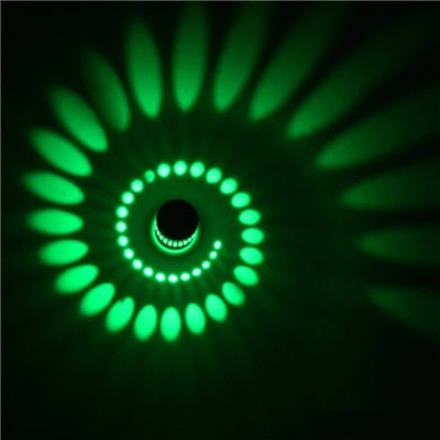 Modern LED spiral lamp illuminating a hallway, showcasing its unique design.