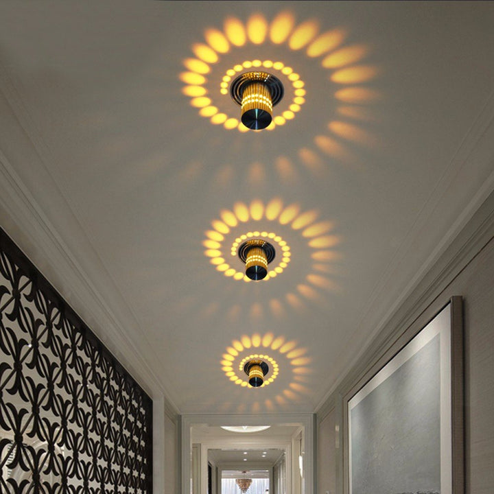 Sleek LED Spiral Ceiling Light, white, providing ambient illumination in a modern space.
