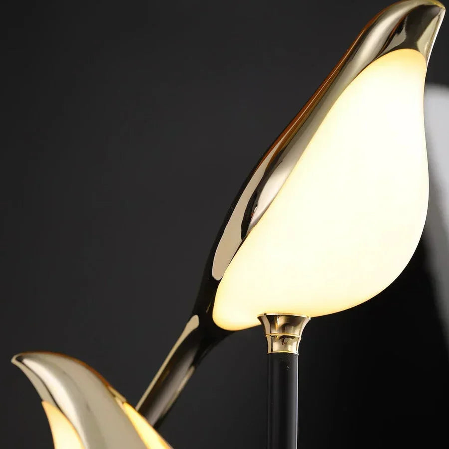 Stylish AvaBird LED table lamp, gold finish, ideal modern lighting for living room, bedroom, or study.