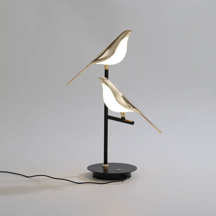 Luxury LED table lamp with sleek galvanized gold finish. A modern home decor piece, perfect for ambient light.