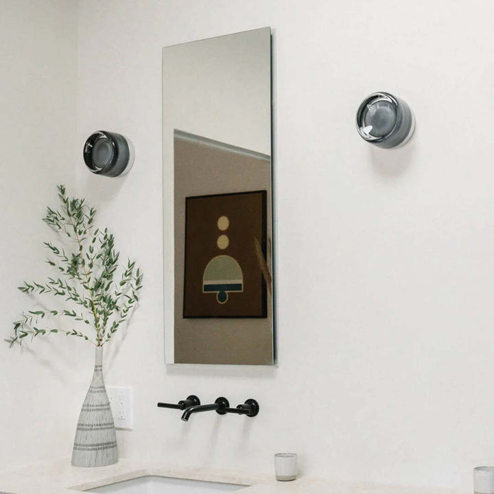 Contemporary LED wall lamp, an energy-efficient hardwired fixture for stylish home lighting & decor.
