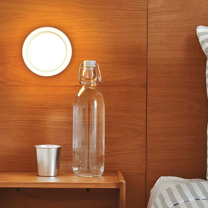 Elegant modern LED wall lamp, a chic hardwired fixture providing ambient lighting for any contemporary space.