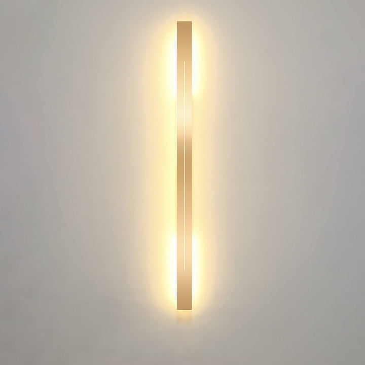 Gold LED wall lamp with modern minimalist design, perfect for sophisticated indoor spaces.