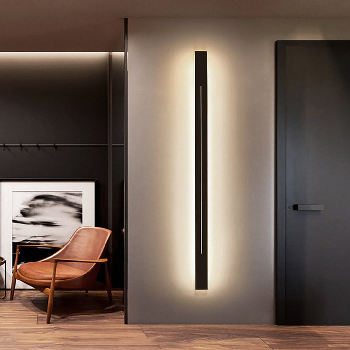 Black LED wall lamp with minimalist design, ideal for hallway lighting & contemporary spaces.